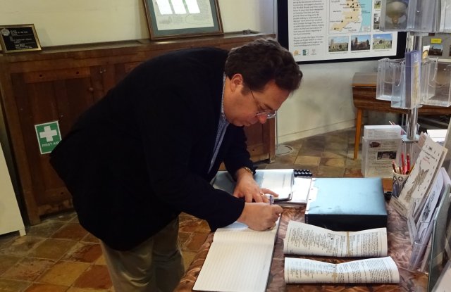 Signing Visitor's
                      Book