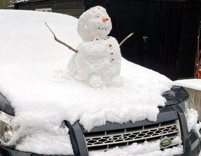 snowman on car